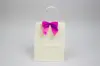 4" X 3-1/4" SATIN AZALEA PRE-TIED BOW CLEAR TWIST TIE