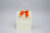 4" X 3-1/4" SATIN ORANGE PRE-TIED BOW CLEAR TWIST TIE