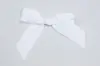 3-1/2" X 2-3/4" GROSGRAIN SOLID WHITE PRE-TIED BOW CLEAR TWIST TIE